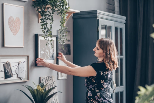 portrait-positive-young-girl-attentively-looking-paintings